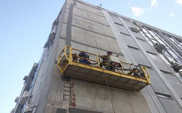 Restauração de fachada com granilha
